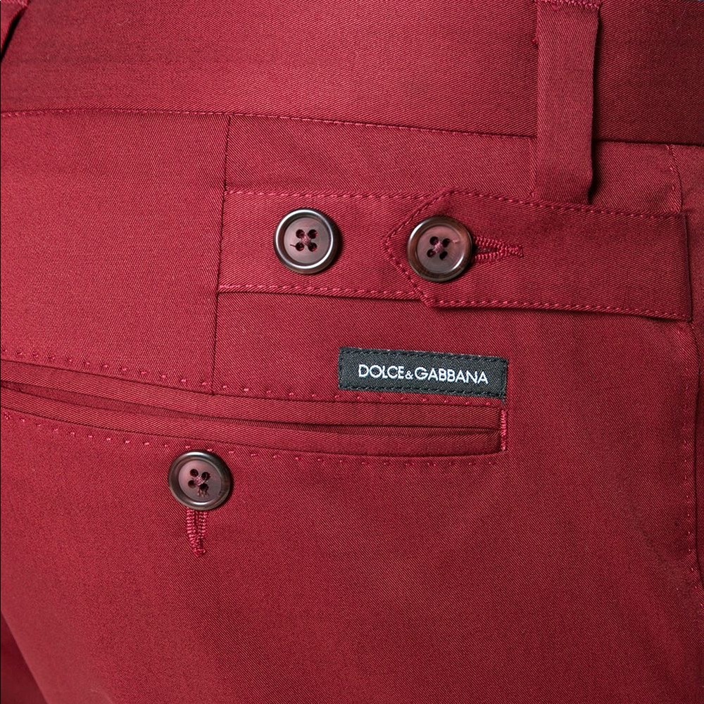 Red cotton blend tailored trousers from Dolce &
Gabbana